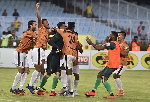 Gokulam Kerala FC footballers celebrate with their goalkeeper C.K.Ubaid. (Photo | PTI)