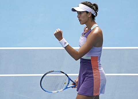Spain's Garbine Muguruza reacts after defeating Kiki Bertens of the Netherlands in their fourth round singles match at the Australian Open. (Photo | AP)