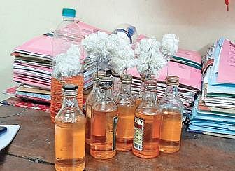 Gurumurthy posted a photo of petrol bombs allegedly seized on Twitter