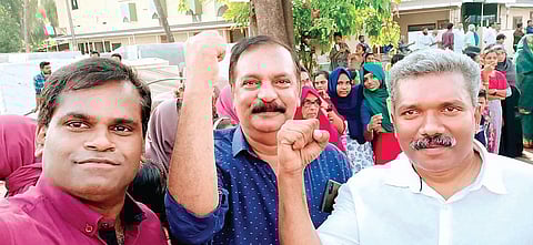 K M Basheer (centre) at the LDF human chain protest on Sunday