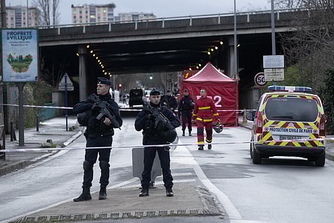 Riot police officers secure the area after a man attacked passerby on Friday in Villejuif, south of Paris (Photo| AP)
