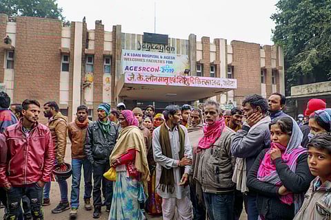 Family members and relatives of their infant children wait outside the JK Lone hospital in Kota district Thursday Jan. 2 2020. (Photo | PTI)