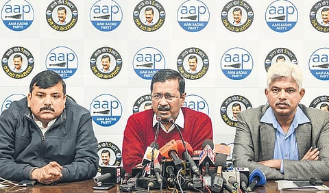 Delhi Chief Minister and AAP convenor Arvind Kejriwal (C) along with party leaders Sanjay Singh (L) and Pankaj Gupta at a press conference at the party office in New Delhi on Thursday| PTI