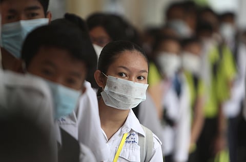 Students line up to sanitize their hands to avoid the contact of coronavirus before their morning class at a hight school in Phnom Penh, Cambodia, Tuesday, Jan. 28, 2020. ( File Photo | AP)