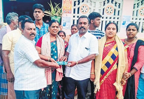 Dhanasekaran, Selvi and Kanchana with well wishers | express