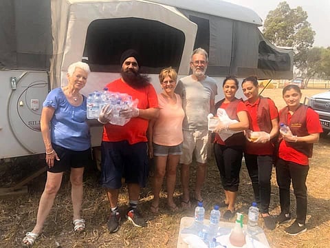 The team of Desi Grill restaurant in Bairnsdale providing free food to bushfires affected people (Facebook photo)