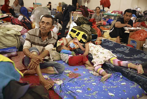 People rest at a temporary shelter for those affected by the floods in Jakarta, Indonesia. (Photo | AP)