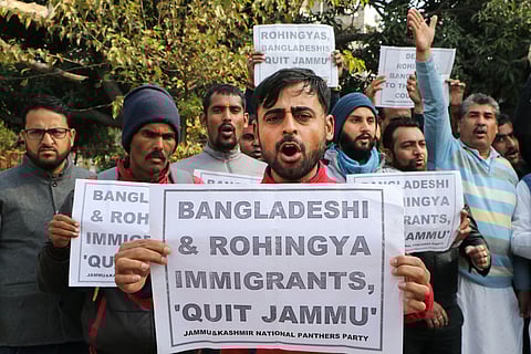 Activists of Jammu and Kashmir National Panthers Party (JKNPP) raise slogans during a protest against the alleged settlement of Rohingyas and Bangladeshis, in Jammu. (Photo | PTI)