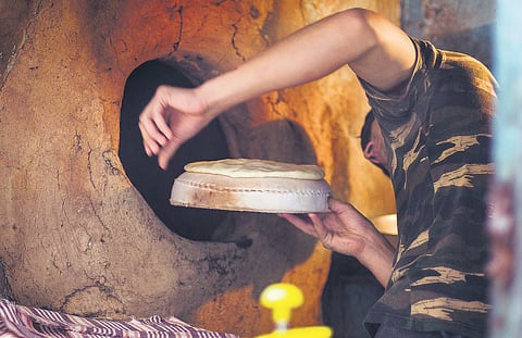 Grocery stores run by Afghans here stock up on these treasured items, while the Afghan naan is ubiquitous, whether in shops, restaurants, or being sold by street vendors, known colloquially as naanwais.