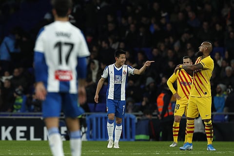 Espanyol's Wu Lei celebrates after scoring his side's equiliser against Barcelona. (Photo | AP)