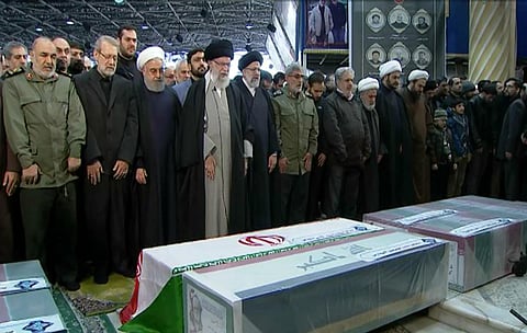 Iran's supreme leader Ayatollah Ali Khamenei (C) leads a prayer over the coffins of Gen. Qassem Soleimani and his comrades, who were killed in Iraq in a US drone strike on Friday (Photo| Office of the Iranian Supreme Leader via AP)
