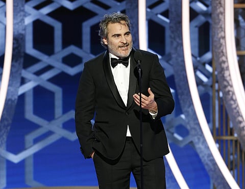 This image released by NBC shows Joaquin Phoenix accepting the award for best actor in a motion picture drama for his role in 'Joker' at the 77th Annual Golden Globe Awards. (Photo | AP)