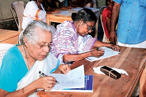 Sarasamma, 90, writes Class IV equivalency examination at the Thrikkannapuram government school on Sunday