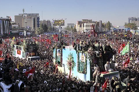 Coffins of General Qassem Soleimani and others who were killed in Iraq by a US drone strike, are carried on a truck surrounded by mourners during a funeral procession in Kerman on Tuesday. (Photo | AP)