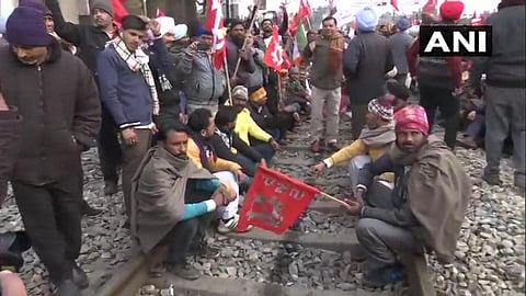 Protesters block a railway track in Amritsar during Bharat Bandh on Wednesday (Photo| ANI)