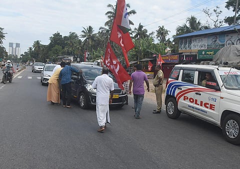 Joint trade union workers blocking vehicles at National Highway in Kazhakkottam in Thiruvananthapuram . (Photo | EPS)