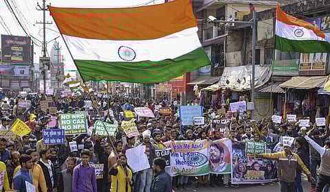 A Bharat Bandh called by 10 central trade unions along with different federations is being organised to protest against 'anti-worker policies of the BJP government'. Here are pictures from the 24-hour nationwide strike across India. (Photo | PTI)