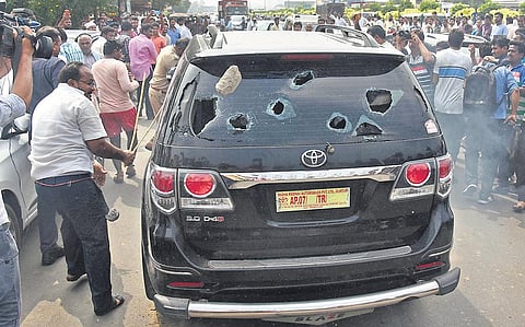 The damaged car of YSRC Macherla MLA Pinnelli Ramakrishna Reddy at Chinakakani in Guntur district on Tuesday | P Ravindra Babu