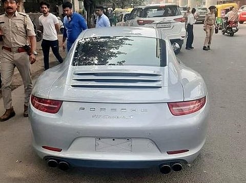 Initially, a fine of Rs 9.8 lakh was slapped, but when the owner went to deposit that amount, the RTO dug out old records and imposed the penalty of Rs 27.68 lakhs. (Photo | Twitter/@AhmedabadPolice )