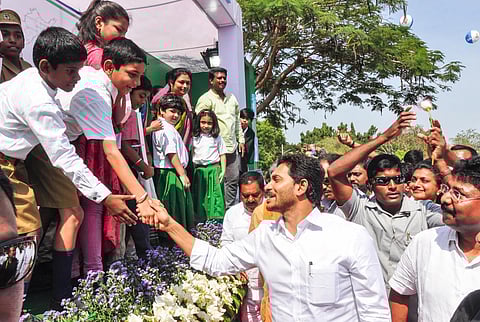 Andhra Pradesh CM Jagan Mohan Reddy addressing the meeting at PVKN grounds in Chittoor on Thursday. (Photo | Madhav K, EPS)