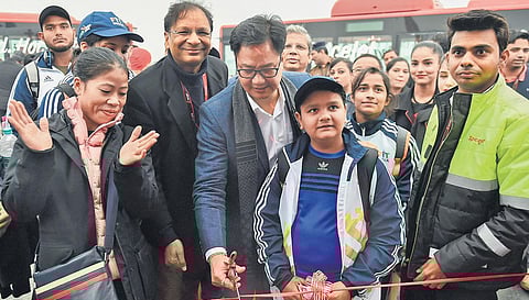 Sports Minister Kiren Rijiju with MC Mary Kom (L) & SpiceJet CEO Ajay Singh (C) during the launch ceremony of the 1st Khelo India Spicejet flight, in New Delhi
