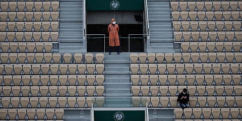 A lone spectator at Suzanne Lenglen court watches Victoria Azarenka in the first round match of the French Open tournament against Danka Kovinic at the Roland Garros stadium in Paris. (Photo | AP)