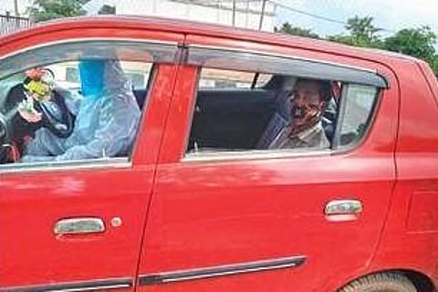 Ramchandani driving the Covid patient in his car. (Photo | EPS)