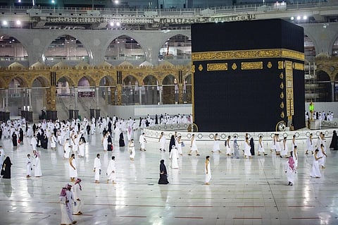 Muslims pray around the Kaaba during the first day of Umrah in Mecca, Saudi. (File Photo | AP)