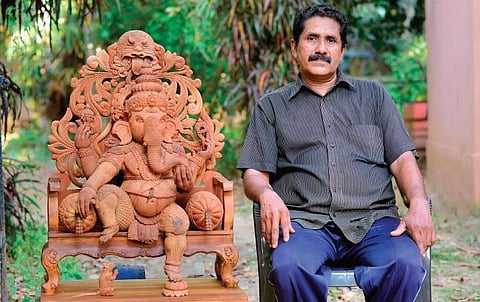 A Prathap with his Ganapathy idol that was considered for the award