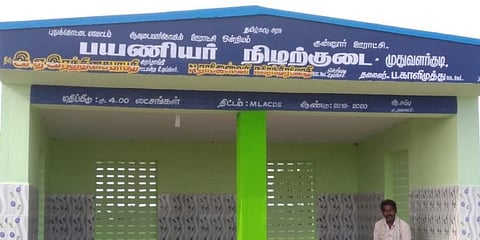 The newly-painted display without the name of the Union Chairman on the bus stand at Muthuvalarkudi village in Pudukkottai. (Photo | EPS)