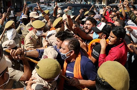 Rashtriya Bajrang Dal men raise slogans against 'derogatory remarks' by Jammu Kashmir National Conference President Farooq Abdullah regarding Article 370 in Jammu. (Photo | PTI)