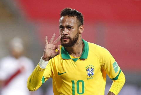 Brazil's Neymar celebrates scoring his third goal against Peru. (Photo | AP)