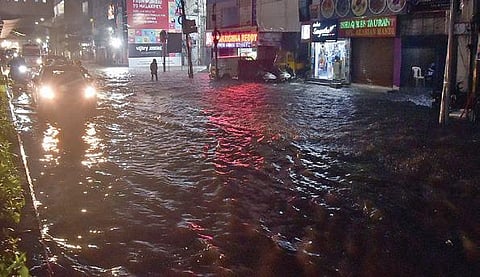 A view of the Mahboob Mansion Market road in Hyderabad which got inundated on Tuesday evening.