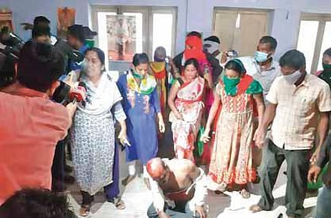 Exorcist-cum-journalist P Shivaprasad, accused of raping a minor girl, was beaten up by her family members on Tuesday.