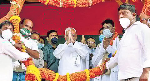 Bihar Chief Minister Nitish Kumar being garlanded by JD-U supporters during an election rally at Amarpur in Banka district on Wednesday