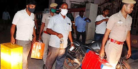 DVAC officers taking out cash and valuables from the residence of TNPCB JCEE Pannirselvam after completing the raids (Photo | S Dinesh)