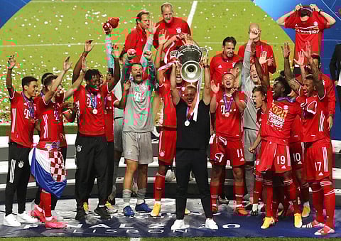 Bayern Munich raises the UEFA Champions League trophy after defeating PSG 1-0. (Photo | AP)