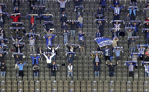 Supporters sing the team's anthem prior to the German Bundesliga soccer match between Hertha BSC Berlin and Eintracht Frankfurt in Berlin, Germany. (Photo | AP)