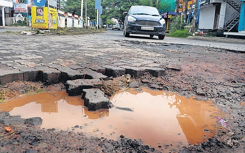 The opening stretch of Kaloor-Kadavanthra road filled with potholes | FIle pic