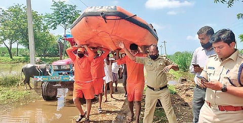 NDRF personnel get ready for flood relief works in Vijayapura on Saturday