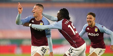 Aston Villa's Ross Barkley (L) celebrates after scoring during the EPL match against Leicester City at the King Power Stadium. (Photo | AP)