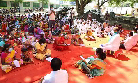 DMK MLA EV Velu chairing a grama sabha meeting at Nachananthal village in Tiruvannamalai (Photos by Special Arrangement)