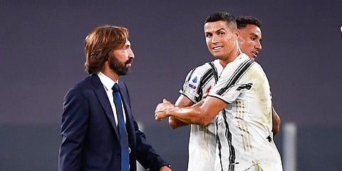 Juventus coach Andrea Pirlo, with Cristiano Ronaldo. (Photo | AP)