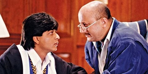 Bollywood actors Shah Rukh Khan (L) and Anupam Kher in 'Dilwale Dulhania Le Jayenge'. (Photo | Anupam Kher Instagram)