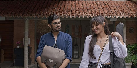 Sikkil Gurucharan (L) and Andrea Jeremiah in a still from 'Putham Pudhu Kaalai'. (Photo| Cinema Express)