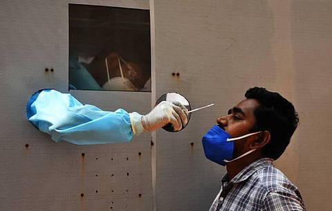 A man undergoes COVID-19 test at a kiosk in Vijayawada (File Photo | EPS)