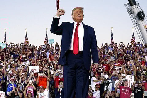 President Donald Trump arrives for a campaign rally at Orlando Sanford International Airport (Photo | AP)