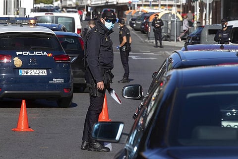 Police mount a checkpoint on the outskirts of Madrid, Spain. (Photo | AP)