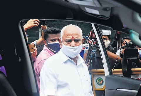 Chief Minister B S Yediyurappa leaves his office in Bengaluru on Saturday | express