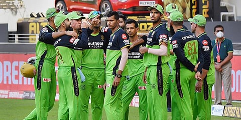 Royal Challengers Bangalore players during the IPL match against Chennai Super Kings at the Dubai International Cricket Stadium. (Photo | PTI)